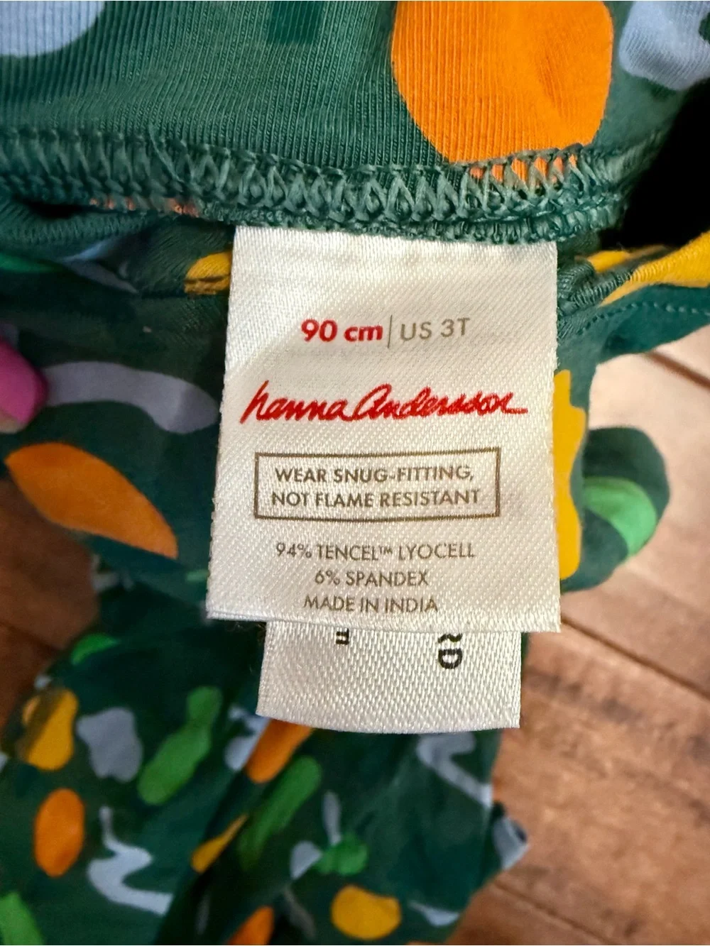 Hanna AnderssonGreen Printed Zip Front Footie Pajamas with Yellow Accents